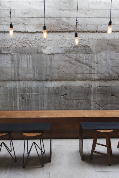 istock Layout in a loft style in dark colors open space interior view of various coffee Welcome open coffee shop background 1352391894