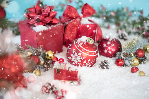 istock Christmas Gifts and Baubles on a Blue Background 1352394646