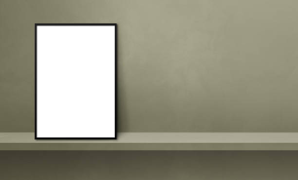 istock Black picture frame leaning on a green shelf. 3d illustration. Horizontal banner 1352400743