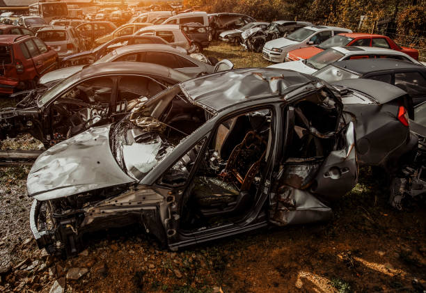 istock Junk yard with many wrecked car 1352400926