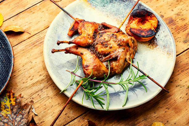 istock Quail barbecue with quince 1352403469