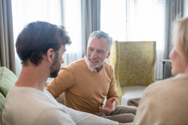 istock Son visiting his parents and talking to them 1352410339