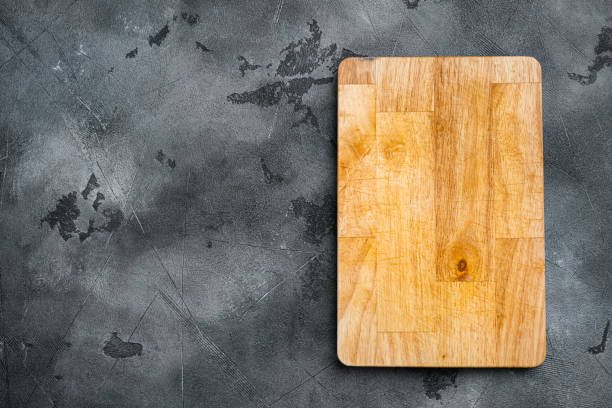 istock Cutting board, on gray stone table background, top view flat lay , with copy space for text or your product 1352416996