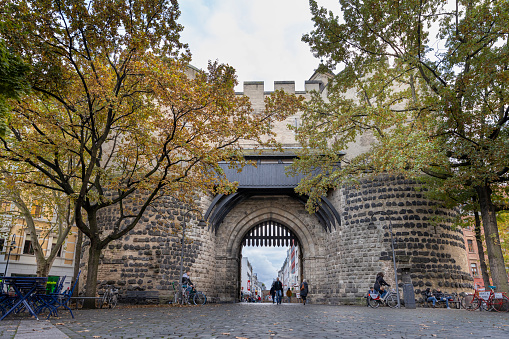 Cologne, Germany - Oct 23 2021: Parts of ancient city wall and gates are still visible around Cologne downtown area.