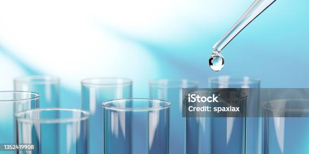 Test Tubes And Flasks In A Medical Laboratory Biotechnology Background Stock Photo - Download Image Now