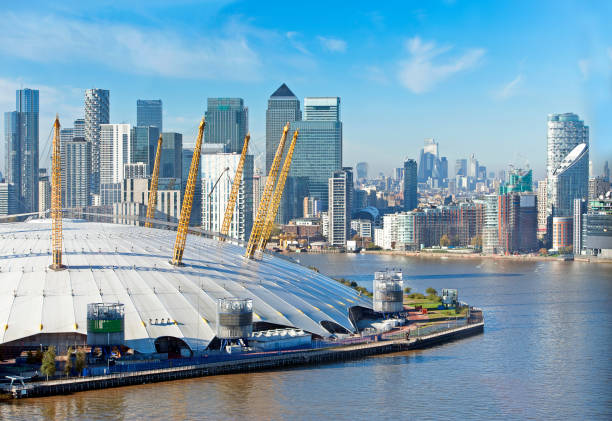 View over the O2 towards Canary Wharf, Greenwich, London, UK stock photo