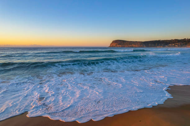 istock Surfs up aerial sunrise seascape 1352422752