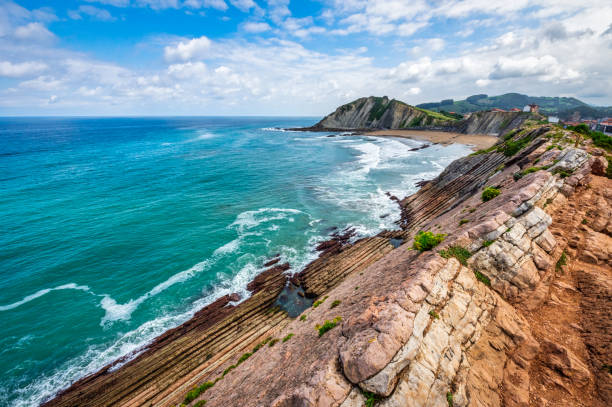 Storm clouds over Zumaia in the coast of Gipuzkoa Basque country Spain