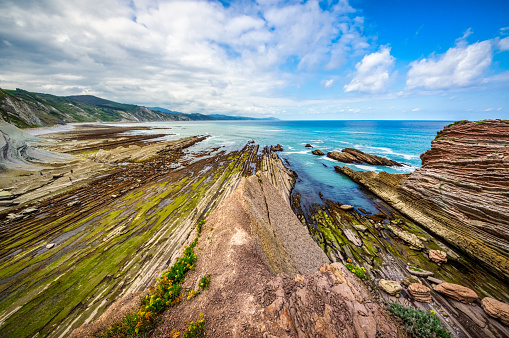 Elevated point of view of the Low tide at Zumaia flysch. Guipuzcoa. Basque Country, Spain