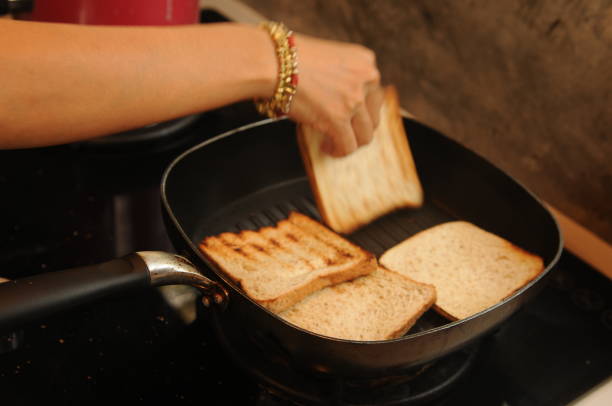 istock four pieces of sandwich bread in a pan 1352424144