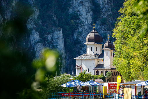 Orsova, Banat, Romania - August 04, 2021: The Mraconia Monastery at the Danube River in Romania