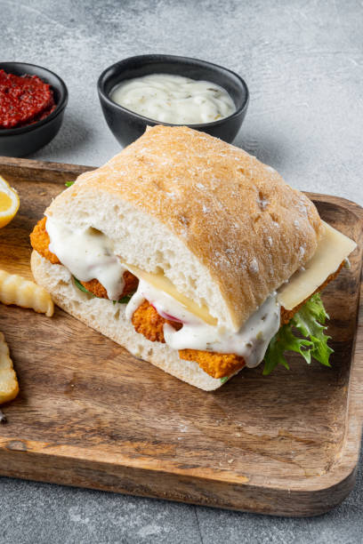 istock Fish fingers sandwich , on gray background 1352425874