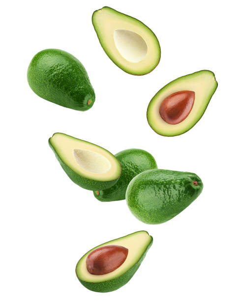 istock Falling avocado isolated on white background, full depth of field, clipping path 1352426150