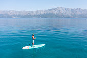 istock Drone view of man on a stand up paddle in Croatia 1352426352