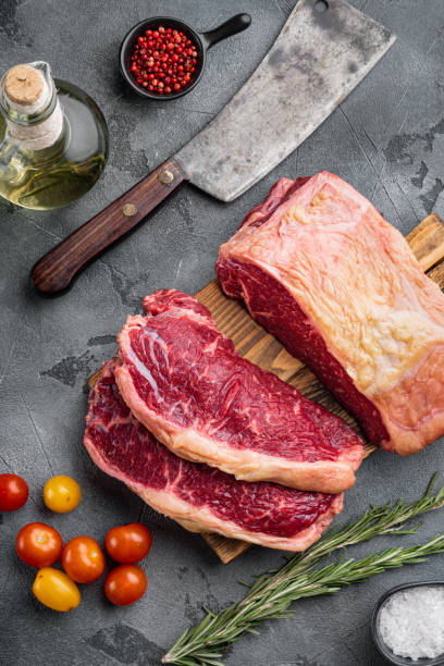 istock Fresh beef boneless club steak, on gray background, top view 1352427387