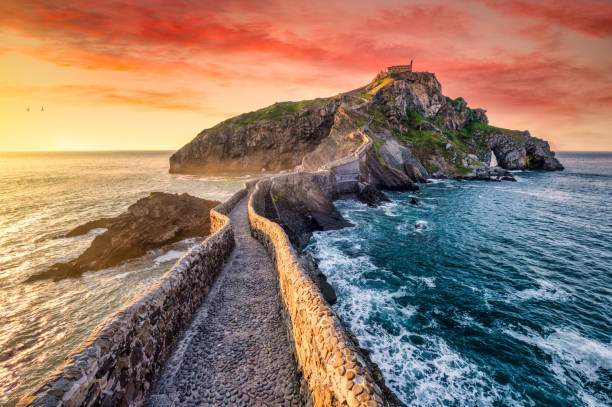 rock path in San juan de gaztelugatxe (dragonstone) at sunset