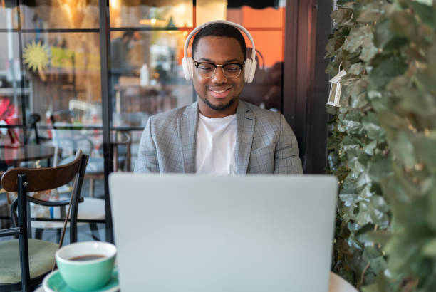 istock Male Freelancer At Coffee Shop 1352439490