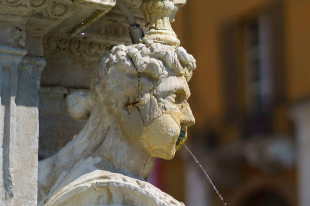 Cesena, Italy - June 3, 2021: Cesena, Emilia-Romagna, Italy: historic fountain in the castle square