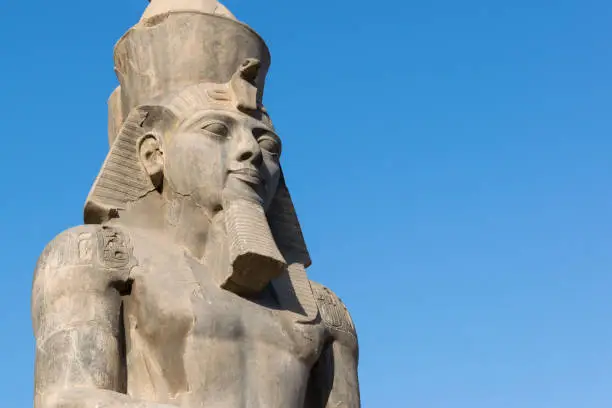 Photo of Statue of Ramesses II at Luxor temple with copy space