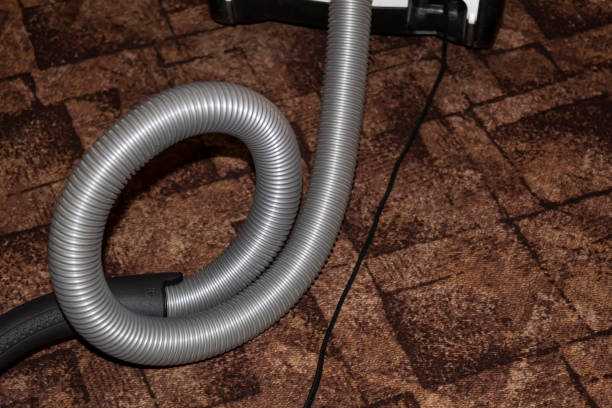 istock Close up of a vacuum cleaner hose 1352444196