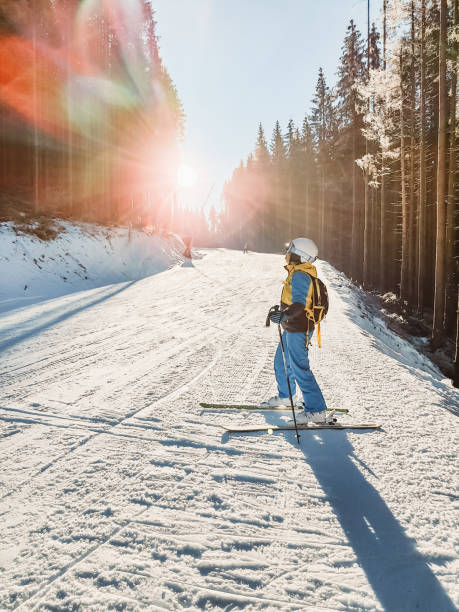 istock woman in equipment at ski slope 1352445408
