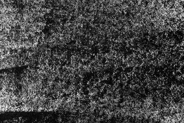 istock Grunge white color chalk texture on blackboard or chalkboard background with copy space 1352457119