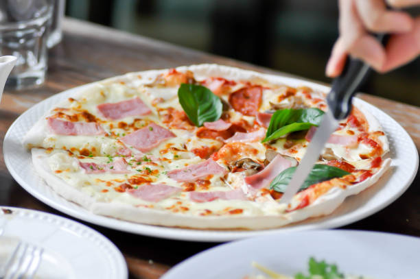 istock pizza or pepperoni pizza and ham and cheese pizza 1352457431