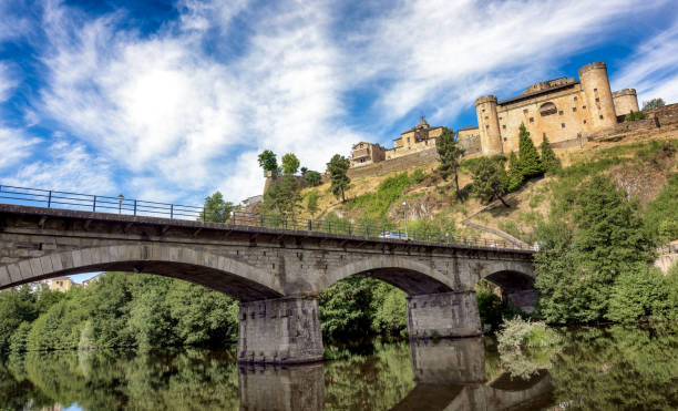 View of river bridge and old town in Puebla de Sanabria. stock photo