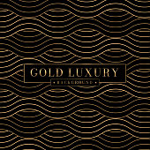 istock Abstract gold luxury wavy lines seamless pattern. Japanese style curve wave background 1352462308
