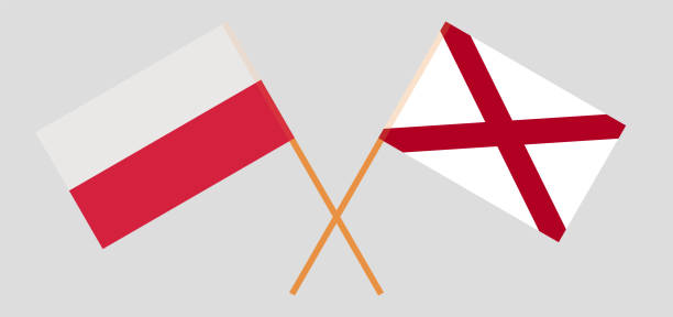 Crossed flags of Poland and The State of Alabama. Official colors. Correct proportion Crossed flags of Poland and The State of Alabama. Official colors. Correct proportion. Vector illustration alabama football stock illustrations