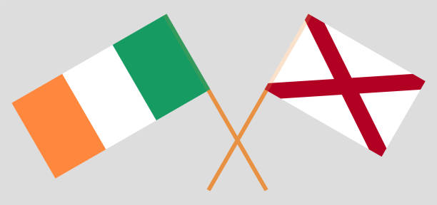 Crossed flags of Ireland and The State of Alabama. Official colors. Correct proportion Crossed flags of Ireland and The State of Alabama. Official colors. Correct proportion. Vector illustration alabama football stock illustrations