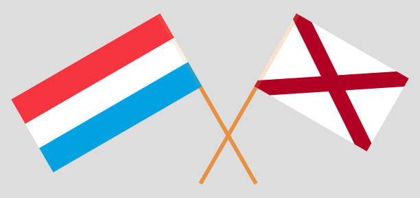 Crossed flags of Luxembourg and The State of Alabama. Official colors. Correct proportion Crossed flags of Luxembourg and The State of Alabama. Official colors. Correct proportion. Vector illustration alabama football stock illustrations