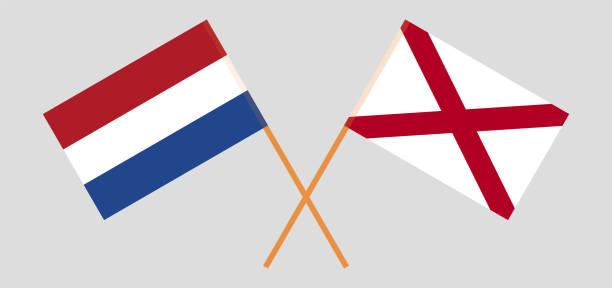 Crossed flags of the Netherlands and The State of Alabama. Official colors. Correct proportion Crossed flags of the Netherlands and The State of Alabama. Official colors. Correct proportion. Vector illustration alabama football stock illustrations