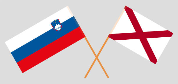 Crossed flags of Slovenia and The State of Alabama. Official colors. Correct proportion Crossed flags of Slovenia and The State of Alabama. Official colors. Correct proportion. Vector illustration alabama football stock illustrations