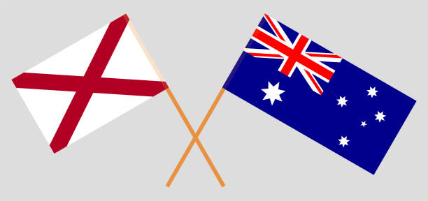 Crossed flags of The State of Alabama and Australia. Official colors. Correct proportion Crossed flags of The State of Alabama and Australia. Official colors. Correct proportion. Vector illustration alabama football stock illustrations