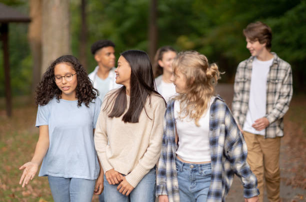 istock Teenagers Walking Outside Together 1352464224