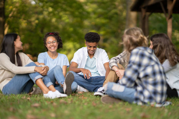istock Teenagers Hanging Out Together Outside 1352464232