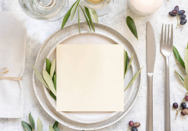 istock Wedding Table place with a card decorated with olive branches 1352464403