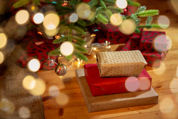 istock Christmas gift boxes under Christmas tree. Winter holiday concept. 1352464774