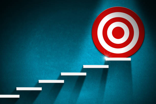 istock White Stair and Target on Blue Wall with Copy Space - Goal Concept 1352467799