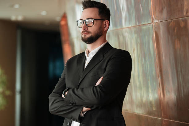 istock Man in suit and eyeglasses 1352470651