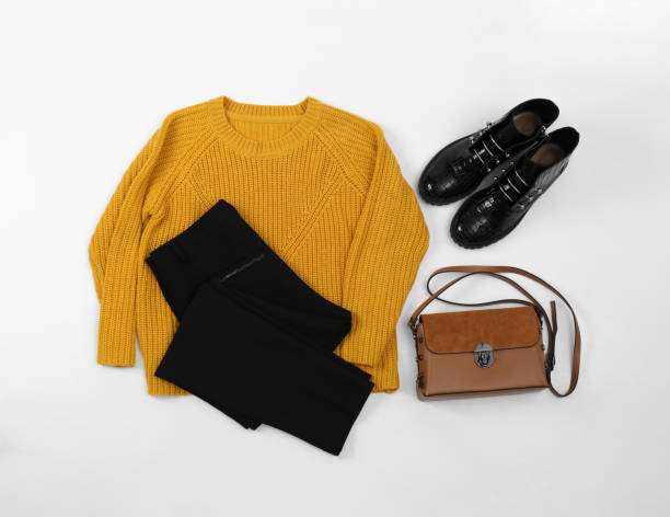 istock Set with ankle boots, stylish clothes and bag on white background, top view 1352472296