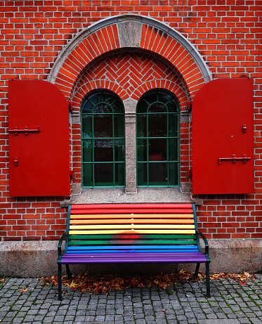 Rainbow bench by an old building in Malmo, Sweden.
