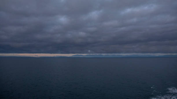 istock Scenic view of the Pacific Ocean at sunrise 1352476268