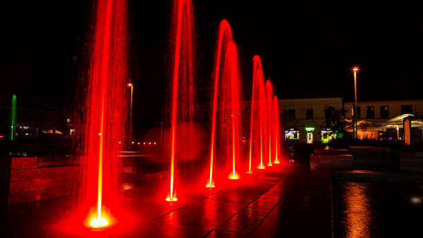 istock Illuminated colorful fountains 1352479596