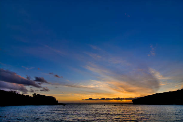 istock The Sun Setting in the Sea 1352479777
