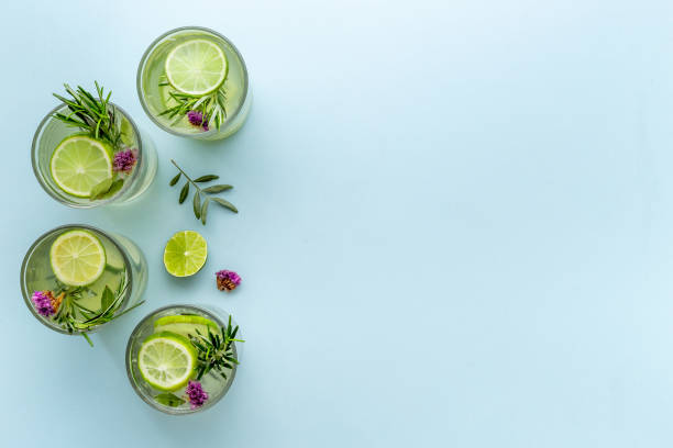 istock Fresh cold beverage with summer herbs and lemon in glasses 1352479897