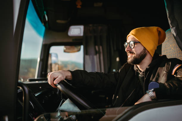 istock The truck driver is driving 1352481442