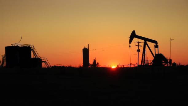 istock Texas Oil Pump in Silhouette 1352481513