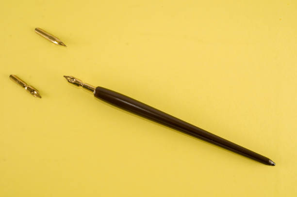 istock Antique ink pen background 1352482453